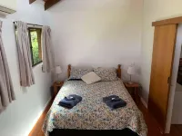 Cranley Garden Retreat with Fireplace & Pool
