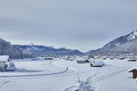 Cozy 65 sqm attic apartment with open roof truss and two balconies