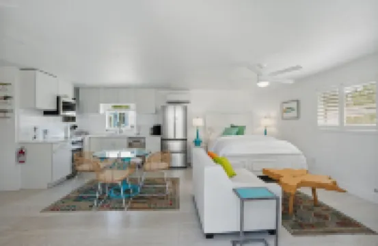 The Historic Coquina Cottages C is 2 Blocks to the Beach, 5th Avenue and 3rd St.