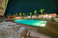 Beachfront Patio w Dune View 2 Pools Pickleball Cravin Waves by AvantStay Hotels near Port Aransas Nature Preserve at Charlie's Pasture