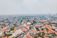 Homey and Cozy Stay 1Br Tamansari Bintaro Mansion Apartment Hotels in Pondok Aren