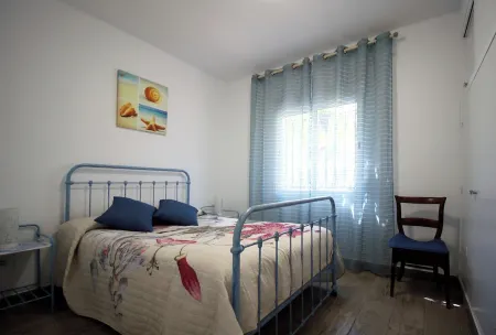 Casa Adosada con Jardin y Barbacoa a dos Pasos de la Playa Отели в г. Торредембарра