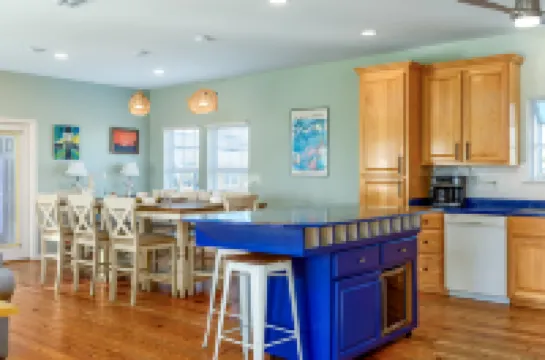 Spacious Beach House with Stunning Deck Views - Vibrant Tropical Escape