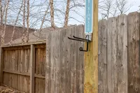 Dog-friendly home with a firepit, yard, washer/dryer, central AC & game room