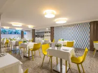 馬爾露台套房飯店 丽都附近的飯店