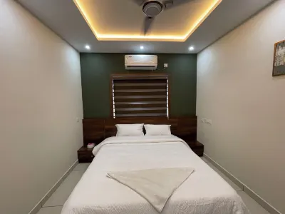 Town inn Apartments Hotels in Perintalmanna