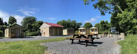 Canal Cabins Отели в г. По По