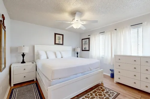 Beachfront townhome w/ on-site beach access, heated pool, patio, grill, AC, W/D