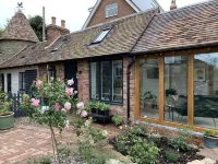 Boutique garden apartment with decking and views