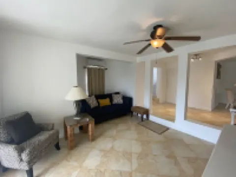 Roomy Lower 3 Bedroom West Coast Property with Pool Hotels in Mount Standfast