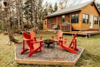 Escape to Tranquility at The Sandy Pearl: A Cozy Log Cottage Retreat