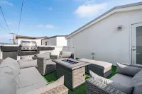 Private Rooftop Steps to the Beach Chic Design Seaside Style by AvantStay