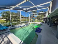 Sadie's Daytona private pool home with 5 king beds , pool table and arcade games