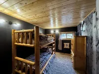 Charming 2-bedroom cabin with WiFi, AC near ATV routes, & Rock Dam Lake.
