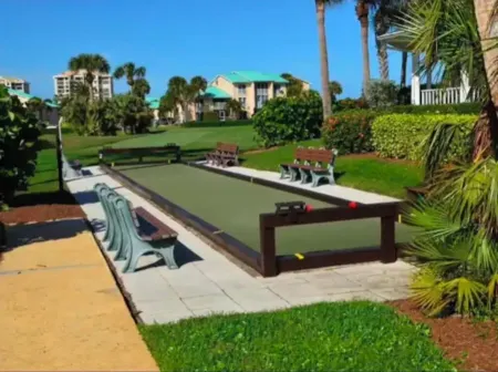 Coastal condo with patio, steps away from the beach in exclusive gated community