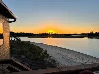 Sunset Lake Paradise new 4-bedroom lake house with private beach, WiFi, and AC