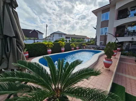 Cozy 2-Bedroom Haven in the Heart of Accra Отели в г. Adjiringanor