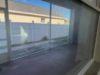 Newer Construction Home in Port Richey, High Ceilings Screened Lanai & Lake View