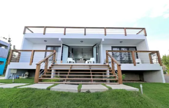Minutes from the beach, modern home with ocean views. Pet friendly!