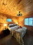 Snowmobile Cabin with Private Hot Tub & Panoramic Lake Views