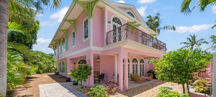 Waterfront Pink House with Private Dock & Pool Hotels in Captiva