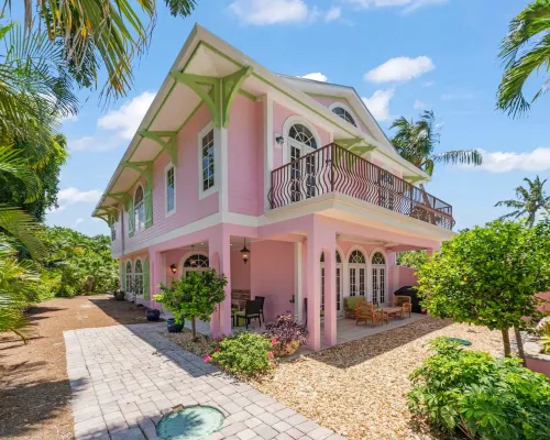 Waterfront Pink House with Private Dock & Pool Hotels in Captiva