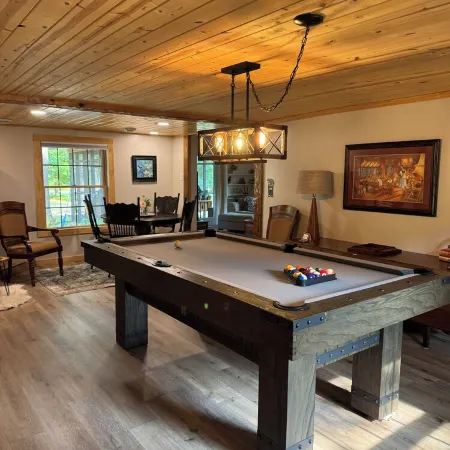Cozy 2 bedroom cabin with fireplace steps to sand bottom swimming and lake views