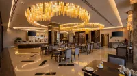 Cheerful Al Waha Unayzah Hotel - parking