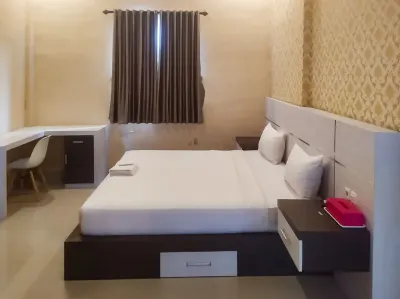 RedDoorz Syariah Near Sultan Syarif Kasim II Airport Các khách sạn ở Tengkerang Labuai