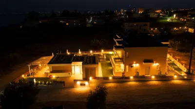 Le Grand Reve Apartments & Luxury Suites Hôtels à : Kalivia Poliyirou
