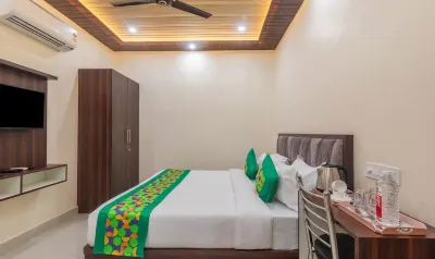 Treebo Golden Kashi Hotels near Climax Academy and Library