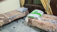 ROOM 9 Serene Retreat in Rawalpindi - Your Home Away from Home 1