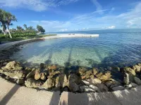 Hidden Sandy cove walking distance  to village