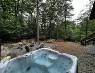 Family Lodge with Hot Tub, AC, Minutes to Lake Placid and Hiking, Pet Friendly