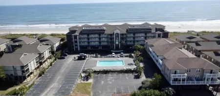 Ocean front 2 bedroom / 2 bathroom condo. Sleeps 6. Elevator/pool/grill.