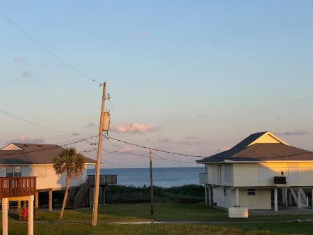 At Coastal Casa enjoy the waves, the breeze, and a quick walk to the sand.