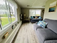 Beach Lovers Paradise!  Cozy 3 bedroom home steps from the beach.