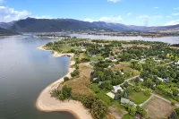 Stunning Lakefront Retreat with Jacuzzi and Unobstructed Mountain Views