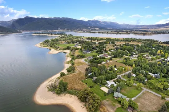 Stunning Lakefront Retreat with Jacuzzi and Unobstructed Mountain Views
