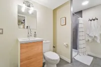 High-end home w/ fireplace, gourmet kitchen, sauna, game rm/ large yard/fire pit