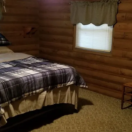 LOG Cabin, 5 miles from town, but very country setting