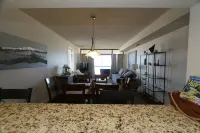 Enjoy Sunrise and dolphin's swimming every morning from your personal balcony!