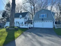 Enjoy spectacular views of Lobster Cove. Large yard, EV charger & dog friendly. Hotels near Walgreens