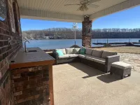 Lake Front Home with 3 steps to water, private dock, quiet cove & flat yard