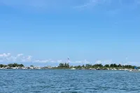 NEW LISTING- Steps to Private Beach. Completely Remodeled Modern Beach House Hotel a Springs