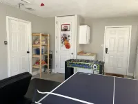 Pet Friendly Fenced Backyard Game Room Patio Firepit Trailer Motorcycle Parking