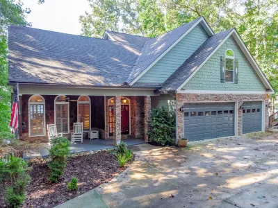 Lakefront 5 BR home nestled on a private cove 1 hr from downtown Atlanta, Ga.
