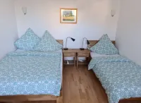 Very quiet, in almost green surroundings