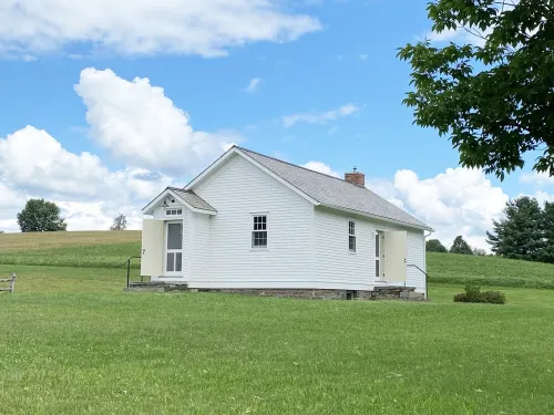 19th century school house converted into a charming two story dwelling