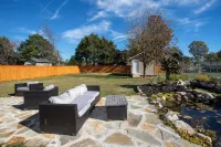 Charming Modern Home with Koi Pond & Spacious Backyard – Sleeps 6 Hotels near Walter Bickett Stadium